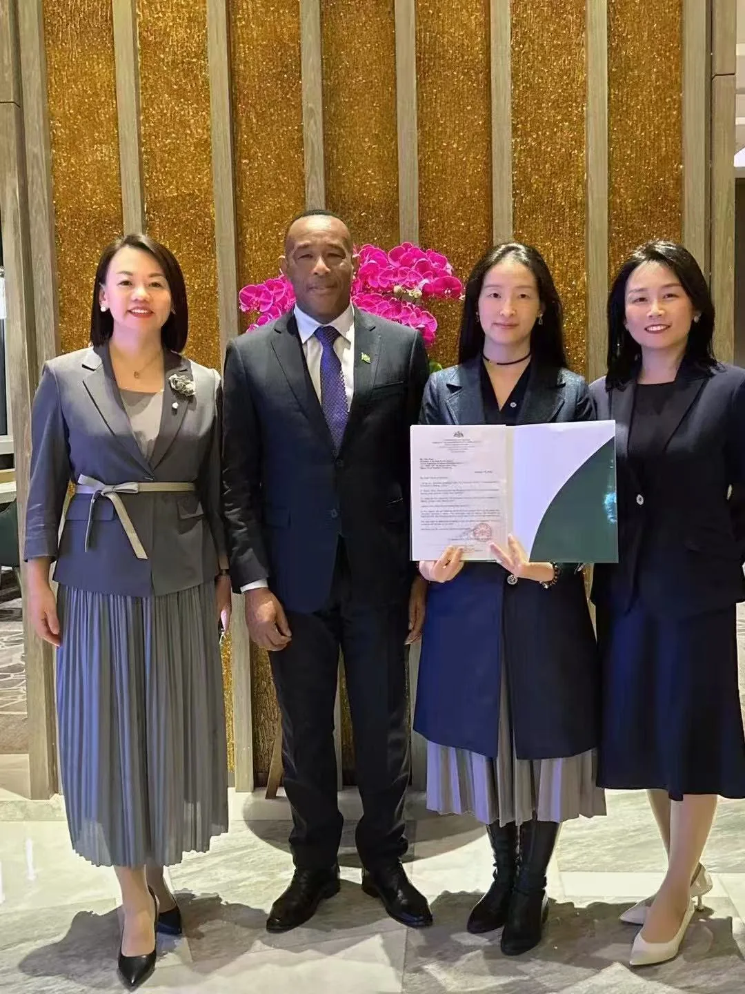 GFWE representatives with H.E. Martin Charles, Ambassador of the Commonwealth of Dominica to China, in Beijing