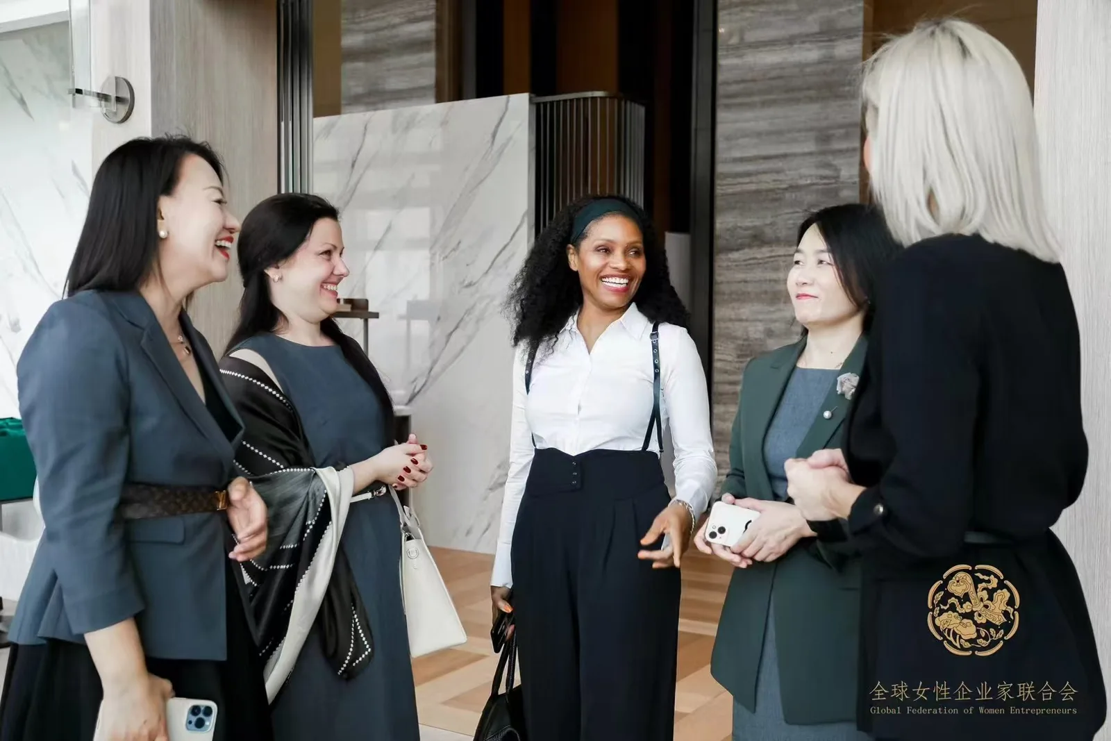 Guests in conversation at the GFWE gathering for women entrepreneurs