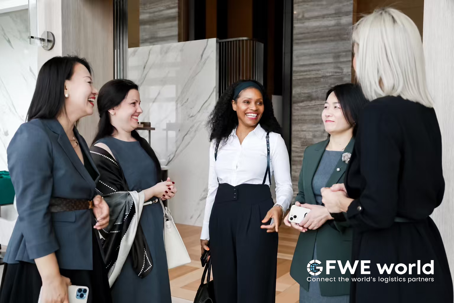 Guests in conversation at the GFWE gathering